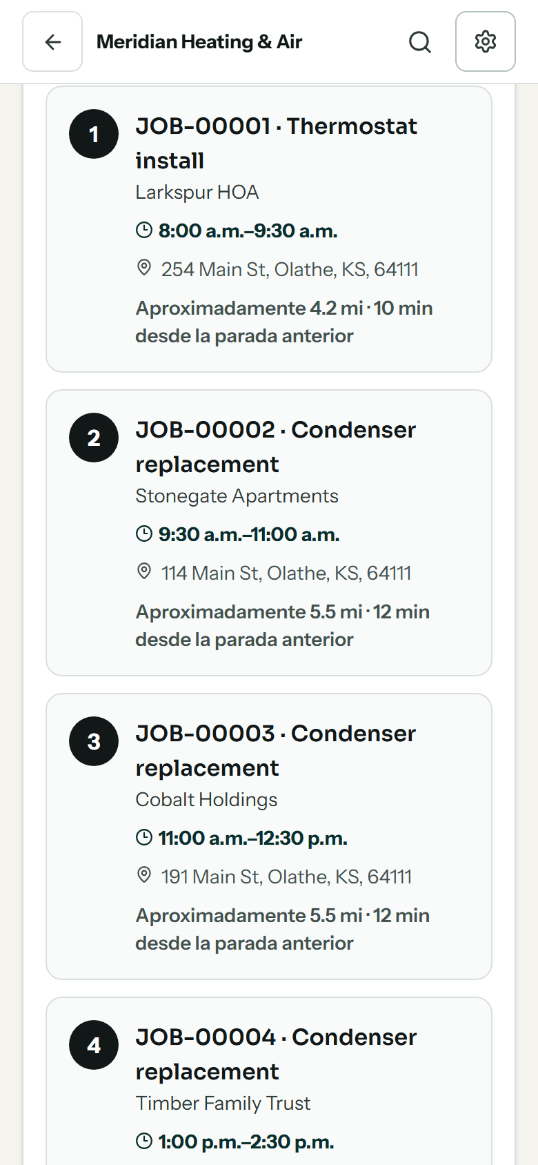 The published route in the crew app in Spanish: the day's stops in order, each with its time window, address and the drive from the previous stop