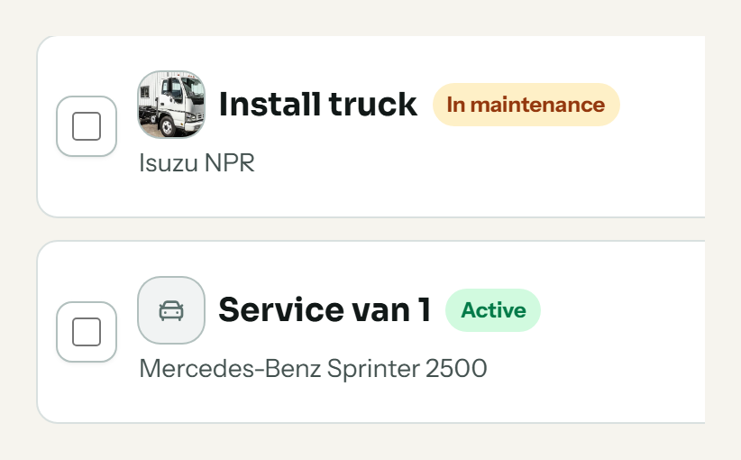 Two fleet records with make, model and status — one in maintenance, one active
